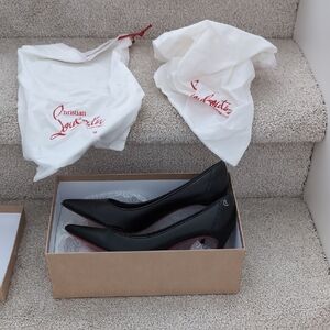 Christian Louboutin Elegant Black Heels with Red Soles